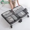 7 PCSET Ox Bolsa de almacenamiento de viaje Ropa interior Zapatos Acabado cosmético Bolsa impermeable Organizador de armario cosmético portátil Y200714