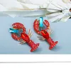 Fashion Trend Orecchini in metallo con cristalli rossi Statement Orecchini pendenti fini Accessori per gioielli di alta qualità per le donne