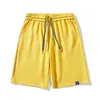 Curto designer masculino s shorts para homens de verão de estilo de estilo de moda 85% hight qualidade cutton calça simples amarelo amarelo sólido mans size short atacado