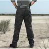 メンズパンツ戦術貨物の男性SWAT戦闘軍事ズボンマルチポケット防水パンツカジュアルアウトドアハイキングスポーツストリートウェア
