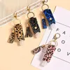 Party Favor New Leopard Print T-Formed Hand Sanitizer Holder med tomt flaskan PU-läderöverdrag Desinfektionsmedel Keychain hängen