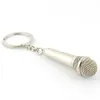 Novel Metal Microphone Keychains Ny designmikrofonnyckel kan med en anteckning inuti