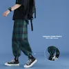 Herrbyxor Plaid Men's 2022 Bekväma lösa streetwear joggar koreanska casual all-match trendiga flanell breda byxor