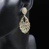 Boucles d'oreilles pendantes en or 18 carats de Dubaï Boucles d'oreilles à pompon en or rose pour une fête de mariage élégante et belle ladys2991794