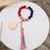 Vente directe d'usine perles en bois bracelet personnalité féminine copeaux de bois peuvent être imprimés chaîne de corde élastique de couleur mélangée multicolore en option