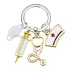 Bulkprissköterskor läkare maskerar nyckelringar hängande medicinsk ambulans personal nyckelringar sprutor stetoskop nyckelring smycken
