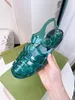 Yeni Avrupa tarzı terlik kadın gladyatör sandalet pvc berrak ayakkabılar moda terlikleri yuvarlak düğme dekorasyon roman dokuma şeffaf renk jöle sandalet hızlı gemi