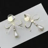 Edelstahl -Bolzenohrringe Designer f￼r Frauen Langkette Buchstabe Perle Ohrringe Kristallohren Einfacher fein Schmuck Dongjewelrys