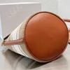 Bolsos de noche Diseñador 2024 Último bolso para mujer Color a juego Bolsa de cubo Moda Versátil Arco Triunfal Lana Solo Hombro Messenger Bolso