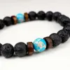 Braccialetti con diffusore per aromaterapia con bracciale in pietra lavica bouddha con perline di pietra di luna nera per uomo9164334