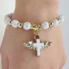 Religieuze kralenhoekvleugels kruisen armbanden rozenkrans middelpunt Heilig hart van Maria Mercy Jesus Saint Iconen sieraden 100pcs