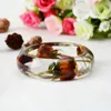 Bracciale 2022 design creativo di moda braccialetto trasparente in resina vera fiore di rosa fiore secco per donne gioielli regalo