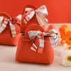 Creative Leather Gift Box Small Handbag Shape Ribbon Bow Temperament Solid Color Candy Box Hand Gift Bag Wedding Supplies Halloween eller Christmas MJ0287
