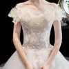 Andra bröllopsklänningar Sexig båthals från axeln 2022 klänning spets broderi blomma plus storlek prinsessan smal med tåg brud klänning lothe