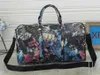 53 cm de grande capacité pour femmes valises sacs de voyages célèbres Classical New Men Spuner Designer Duffel Sacs transportent des bagages