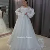 다른 웨딩 드레스 간단한 오간자 환상 O- 넥 두바이 볼 가운 긴 퍼프 슬리브 아플리케 레이스 보우 사우디 아랍어 신부 가운기