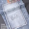 Jeans pour hommes Style de rue mode hommes rétro bleu clair élastique coupe ajustée patchs déchirés concepteur Hip Hop Denim pantalon HombreMen's