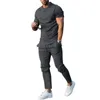 M-3XL Sportswear for Men 2022 New Autumn Summer Summer اثنين من قطعتين من ألوان صلبة قصيرة الأكمام قميص سروال للركض بدلة الركض