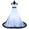 Court train ivoire et bleu Royal robes de mariée 2022 gothique licou broderie à lacets corset pays fermeture robes de mariée