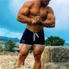 Hombres Fitness Culturismo Pantalones cortos Hombre Verano Gimnasios Entrenamiento Hombre Malla transpirable Secado rápido Ropa deportiva Jogger Playa Pantalones cortos 220630