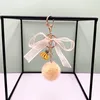 Keychains Creative Keychain Leuke kwastje boog haar kogel auto sleutel ketting fruit kleurtas hanger pluche kleine geschenkaccessoires