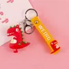 Leuke figuren Little Dinosaur Keychain Cartoon Doll Key Chain Anime Dierparen Gift Silica Gel Fashion Exquisite Keychains Jewe6873274