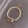 Bedelarmbanden elegante parel boog gouden pak afneembare armband voor vrouw mode sieraden dame zoete temperament bakeletcharm