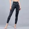 Completi da yoga Pantaloni coloranti Macinazione dei capelli Tessuto nudo Nove pantaloni Donna Vita alta Camouflage Peach Butt Movimento stretto