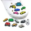 50pc / set automobili automobili guidano ciondoli coccodrillo anime 2D Plastica morbida Zoccolo Accessori per parti di scarpe Bottoni scarpa Fibbia di fascino Decorazione adatta donne Sandali bracciali per bambini