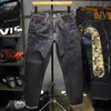 Роскошный дизайнер для мужчин Fushen Jeans Men's Fashion Brand Big M Dragon Emelcodery Первоначально скот, поднимая большие свободные микроэн -конусы супер горячие штаны
