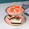 皿の北欧の陶磁器の大理石のテクスチャフルーツケーキの創造的な午後茶デザート料理の多層サービングトレイの結婚式のスタンド