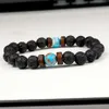 Braccialetti con diffusore per aromaterapia con bracciale in pietra lavica bouddha con perline di pietra di luna nera per uomo9164334