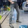 Jeans da uomo testa di tigre ricamata primavera 2022 nuova moda slim fit distintivo stampato piccoli pantaloni dritti streetwear pantaloni in denim