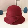 Berretti Cappello Ragazza Autunno Inverno Caldo Bacino Di Lana Pescatore Bowknot Versatile Cappello Da Madre Di Mezza EtàBerretti