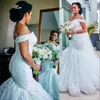 2022 Arabiska vintage sjöjungfru bröllopsklänningar från axel spetsar kristallpärlor kapell tåg plus storlek formell brudklänningar mantel de mariee