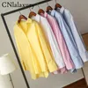 Printemps femme rose boutonné chemises femmes décontracté asymétrique mode jaune blusas à manches longues bureau femme Blouses haut 220727