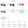 Lunettes de soleil miroir lunettes de soleil de luxe rondes femmes marque designer CatEye rétro lunettes de soleil sans monture femme