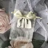 50pcs / lot sac cadeau sac transparent fil de perles de cordon de poche de poche lettre de poche boîte boîte de bonbons de mariage préfigeurs pour invités petit cadeau CX220423