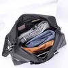 Duffle Bags Erkekler Duffle Bag Bagaj 0T150-1 Kadın Seyahat Yüksek Kadınlar Moda All-Maç Klasik Kapasiteli Büyük Bagaj Çanta Gündelik