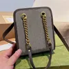 Marmont Minitasche mit Griff oben Schwarzes Matelasse-Chevron-Leder Antikgoldfarbene Hardware Double G Damen Umhängetaschen Luxuriöse klassische Vintage-Schultertasche W8vw #