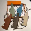 Designer en cuir éléphant lapin pendentif sac pièces litchi motif peau de vache ornement voiture porte-clés sacs décoration 100% peau de vache accessoires ensemble mignon HBP