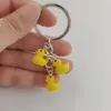 Mode 20 pcs Mignon Petit Jaune Acrylique en plastique CANARD Porte-clés Danse Canard Porte-clés Couples Femmes Ami Cadeau Sac Pendentif Accessoire Porte-clés