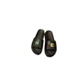 2022 Xiaoxiang vind tofflor kvinnors sommar tjocka botten ett ord tofflor sandaler bär färg godis bokstäver platt häl designer