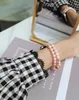 Bracelet Femme Jewely Bracelet Perle Pour Apple Watch Bandes 41mm 45mm 44mm 42mm 40mm 38mm Bracelet iWatch Série 7 6 5 4 3 Bracelet Avec Pendentif Accessoires Intelligents