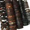 Lotes completos a granel Aleatorio 50pcs30pcslot punk Men039s Braceletas de cuero femme pulseras bileklik pareja pulsera joya w171v8154620