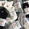 Men's and women's pure cotton socks love embroidery human made middle and high tube sports stocking