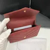 トレンディな女性革のエンベロープウォレットキャビアパターンマネークリップ高品質の手紙ハードウェア財布付き箱付き