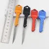 7 färger nyckelform mini folding kniv utomhus sabel fickfruktkniv multifunktionell nyckelring knivar schweiziska självdefenskniv ou359894