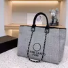 Borse di stilisti di moda Lino Beach Borsa tote di grande capacità di lusso Borsa shopping in tela ricamata Totes Celebrity Party Trasparente Beige Nero Borse versatili