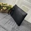 All-leather briefcase for men women. Imported hardware decoration. Removable wristband and other elements to upgrade functionality. Size 30 x 22 x 5 cm